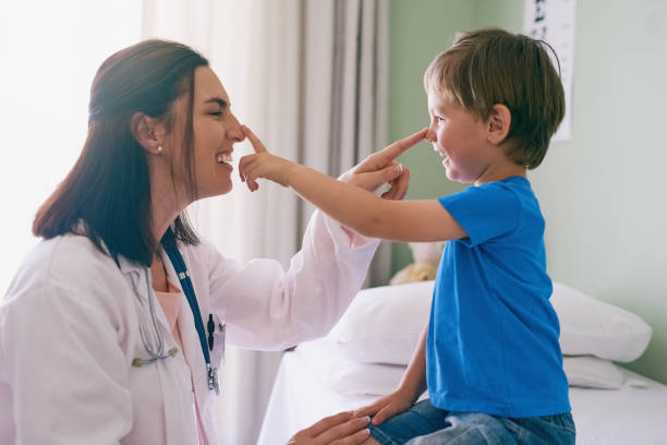 Doctor checking a child